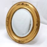 Antique oval gilt wood mirror with bevel plate - 37cm x 32cm - in bright condition