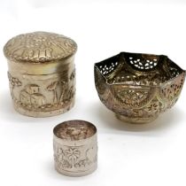 3 x unmarked white metal / silver Asian items - lidded cannister (8cm diameter), pierced decorated