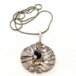 Brutalist style pendant set with lapis lazuli (4cm across) on a silver marked chain (44cm) - SOLD ON