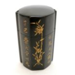 Oriental black lacquer inro with gold character marks and bamboo detail and red character marks to
