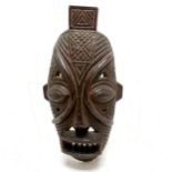 African hand carved wooden tribal mask inscribed CHIK to inside - 38cm & has old damage under chin