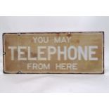 Antique enamel You May Telephone From Here advertising sign 56cm x 23cm. In used condition