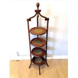 Antique Mahogany cake stand with green baize to the trays.in overall good used condition 119cm