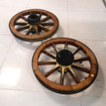 2 antique painted wooden wagon wheels 55cm diameter. In good used condition