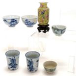 Miniature Oriental yellow grounded vase on stand 7cm high T/W miniature blue and white bowls and