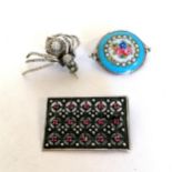 3 unmarked silver brooches, 1 with a floral enamel panel 3.5cm across