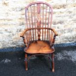 Antique Windsor Oak and Elm pierced splat back elbow chair with crinoline stretcher. 104cm high x