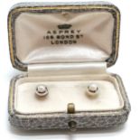 Pair of unmarked (touch tests as high carat) gold & pearl set collar studs (3.5g total weight) in an