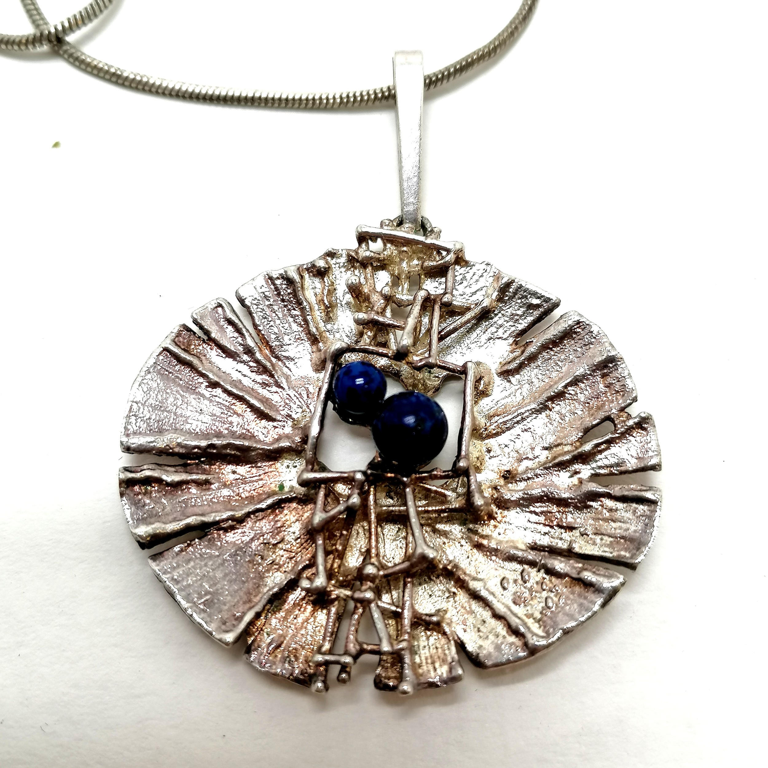 Brutalist style pendant set with lapis lazuli (4cm across) on a silver marked chain (44cm) - SOLD ON - Image 3 of 3