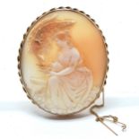 Large antique unmarked gold mounted hand carved shell cameo depicting Hebe offering a cup to her