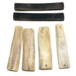 2 pairs bone and a pair of wooden instruments 15cm long