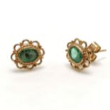 Pair of 9ct gold emerald earrings - 10.5mm across & 1.7g total weight