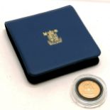 1979 QEII sovereign coin in plastic protector & wallet
