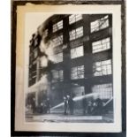 Framed C1932 photograph firefighters in Hackney putting out a blaze at a clothing factory in Mare