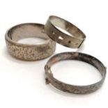 3 x silver marked bangles - 98g ~ large engraved bangle has dents to back - SOLD ON BEHALF OF THE