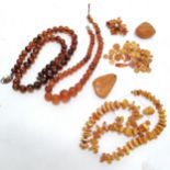 Qty of amber beads (longest (60cm) has white metal clasp), pendant, brooch + loose beads inc