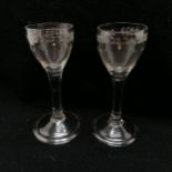 2 x antique 18th century wine glasses with folded footrims, ribbed bowls & hand engraved leaf detail