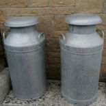 2 Clacton Dairies aluminium milk churns, 77cm high. In good used condition