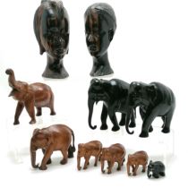 Qty of hand carved elephants t/w pair of zebra wood / ebony busts of male / female (24cm high) -