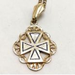 Gold cross pendant with blue enamel detail indistinctly marked (touch tests as 14ct gold) on a metal