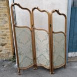 Antique two fold screen with gilt wood frame and bevelled glass panels to the top and fabric to