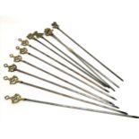 Steel & brass meat skewers comprising 6 x circle / star detail (1 has old repair) & 5 x misc