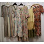 5 1960s Hippy style dresses. 3 floral dresses, 1 tiered coloured dress and 1 knitted coloured dress.