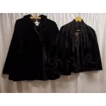 Two victorian black capes, one plain velvet, the other decorated with beadwork, linings split in