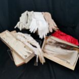 Box of assorted vintage gloves in good condition.