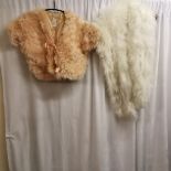 2 maribou feather capes. 1 peach and 1 white. overall good used condition.