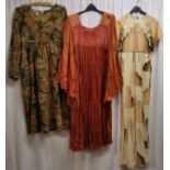 3 1960s long dresses. Burnt orange pleated hippy style dress, with detailed chest and in good