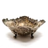 Continental silver embossed bon-bon dish on 4 cast feet - 14cm across x 5.5cm high & 132g