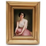 Framed K.P.M. rectangular porcelain plaque of a beautiful young seated lady signed by Wagner -