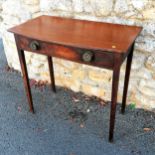 Early 19th century mahogany side table with drawer on squared legs and repousse handles and reeded