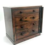 Antique rosewood 4 drawer collectors cabinet with lockable front panel (missing key). 35cm high x