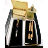 Onyx desk items to include a Ronson lighter and piano hinged box (lid loose), a cased twist biro,