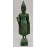 Southeastern Asian Bronze, with green patination standing Buddha standing on a squared base , 31