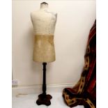 Antique mannequin with mahogany base. 152cm high. some losses to the painted finish on the body