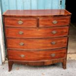 Early to mid 19th century mahogany and satin wood cross banded bow front chest of two over three