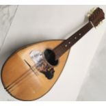 'Carlo Ricordo, Napoli': a mandolin, with Mother-of-Pearl and tortoiseshell inlay with 5 of the 8