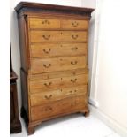 Georgian mahogany chest on chest with dental cornice, blind fret band, quarter reeded columns with