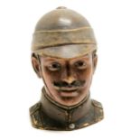 Bernard Bloch pottery tobacco jar modelled as a Boer War British officer - 16cm high & has s;light