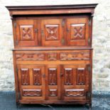 Antique large Oak court cupboard with panel detail with pegged construction with original key and