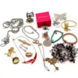 Quantity of costume jewellery, incl. some silver gilt. Monet gold tone and red enamelled earrings