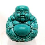 Contemporary turqouise seated figure of a laughing Buddha - 19cm high & no obvious damage