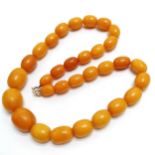 Antique strand of butterscotch amber beads 60cm long & 76g total weight