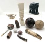 Qty of curios inc bone carving of a seal, african bone carving of a native, seed pods, mate gourd