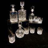 Stuart Crystal decanter set and 2 glasses etched with a golfing figure; 4 cut glass crystal whisky
