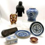 2 Oriental blue and white plates, both A/F, carved wooden figure holding a scroll 25cm high,