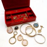 Red jewellery box containing collection of jewellery inc 2 x 9ct gold bangles (25g), 2 gold